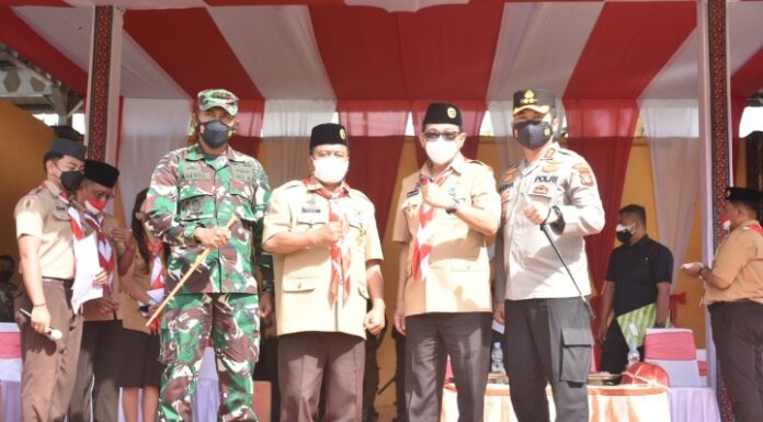 Peringati HUT Pramuka ke-60, Bupati Torut: Tunjukkan Baktimu dengan Menghargai Simbol Negara Hut Pramuka