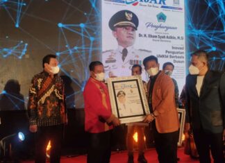 Bupati Torut Yohanis Bassang